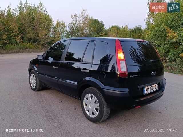 Чорний Форд Фьюжен, об'ємом двигуна 1.4 л та пробігом 166 тис. км за 4400 $, фото 12 на Automoto.ua
