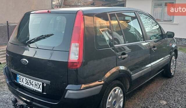 Черный Форд Фьюжн, объемом двигателя 1.4 л и пробегом 237 тыс. км за 4200 $, фото 12 на Automoto.ua