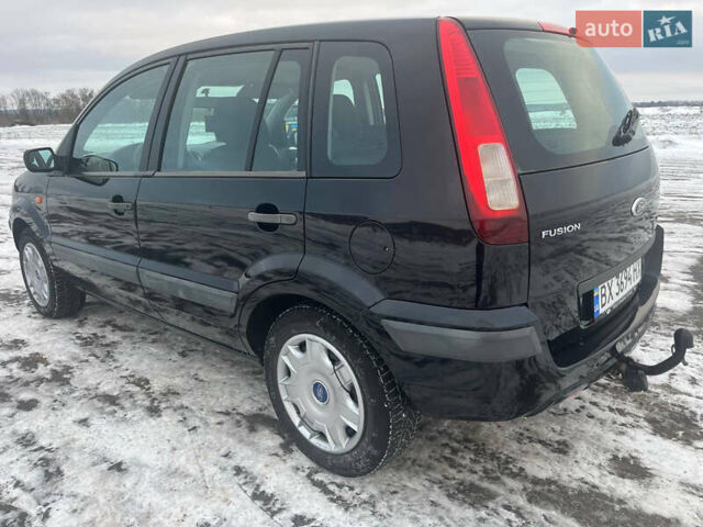 Чорний Форд Фьюжен, об'ємом двигуна 1.39 л та пробігом 237 тис. км за 4200 $, фото 4 на Automoto.ua