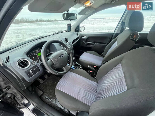 Чорний Форд Фьюжен, об'ємом двигуна 1.39 л та пробігом 237 тис. км за 4200 $, фото 8 на Automoto.ua