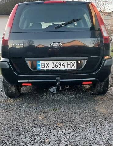 Черный Форд Фьюжн, объемом двигателя 1.4 л и пробегом 237 тыс. км за 4200 $, фото 11 на Automoto.ua