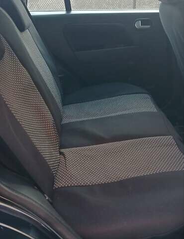 Черный Форд Фьюжн, объемом двигателя 1.4 л и пробегом 237 тыс. км за 4200 $, фото 9 на Automoto.ua