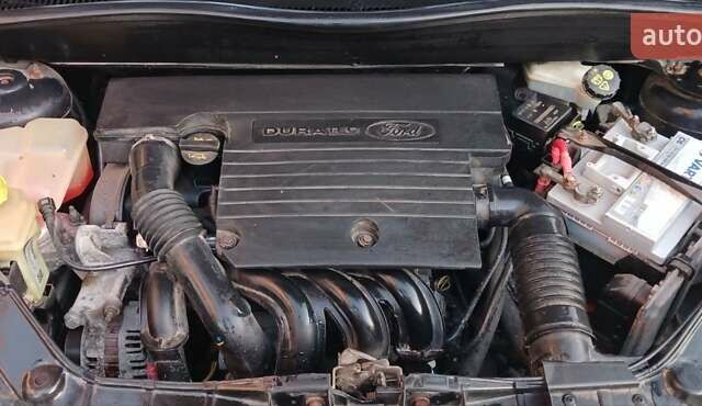 Черный Форд Фьюжн, объемом двигателя 1.4 л и пробегом 237 тыс. км за 4200 $, фото 1 на Automoto.ua