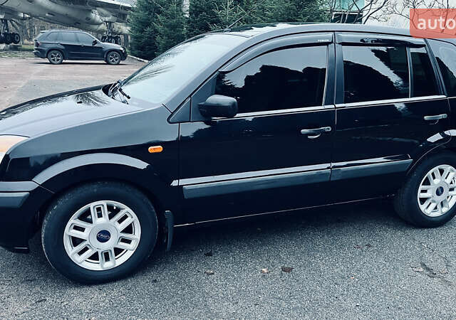 Черный Форд Фьюжн, объемом двигателя 1.4 л и пробегом 173 тыс. км за 5700 $, фото 1 на Automoto.ua