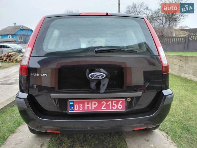 Черный Форд Фьюжн, объемом двигателя 1.4 л и пробегом 180 тыс. км за 4550 $, фото 5 на Automoto.ua