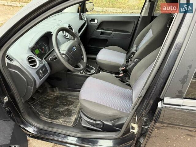 Черный Форд Фьюжн, объемом двигателя 1.4 л и пробегом 216 тыс. км за 3890 $, фото 13 на Automoto.ua