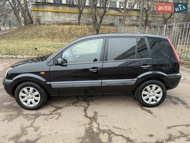 Черный Форд Фьюжн, объемом двигателя 1.4 л и пробегом 216 тыс. км за 3890 $, фото 4 на Automoto.ua