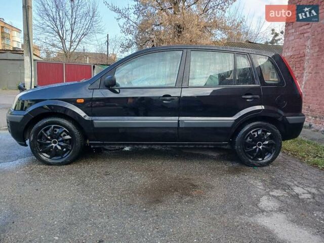 Черный Форд Фьюжн, объемом двигателя 1.4 л и пробегом 185 тыс. км за 5100 $, фото 19 на Automoto.ua