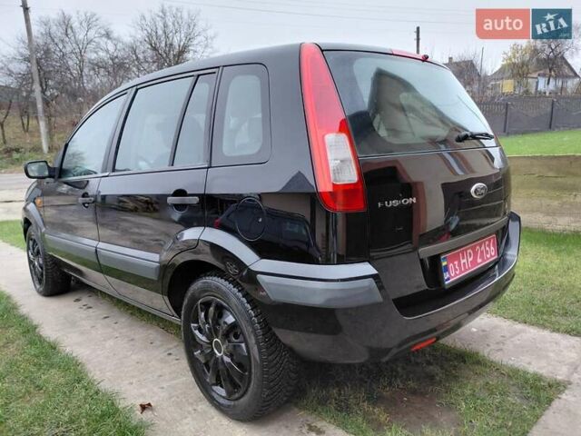 Черный Форд Фьюжн, объемом двигателя 1.4 л и пробегом 180 тыс. км за 4550 $, фото 7 на Automoto.ua