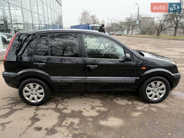 Черный Форд Фьюжн, объемом двигателя 1.4 л и пробегом 216 тыс. км за 3890 $, фото 8 на Automoto.ua