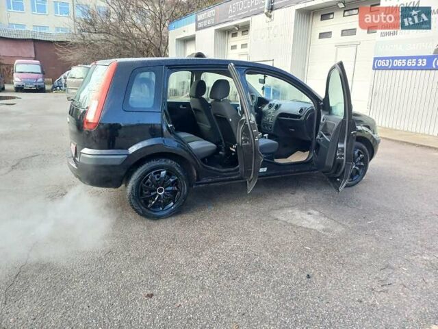 Черный Форд Фьюжн, объемом двигателя 1.4 л и пробегом 185 тыс. км за 5100 $, фото 9 на Automoto.ua