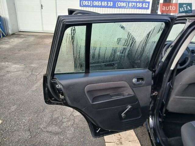 Черный Форд Фьюжн, объемом двигателя 1.4 л и пробегом 185 тыс. км за 5100 $, фото 15 на Automoto.ua