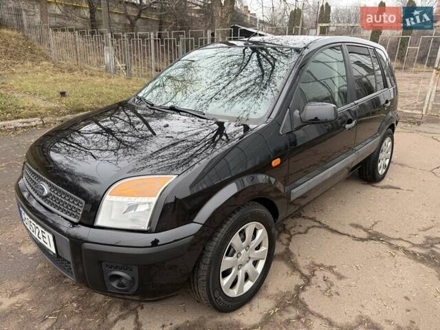 Черный Форд Фьюжн, объемом двигателя 1.4 л и пробегом 216 тыс. км за 3890 $, фото 3 на Automoto.ua