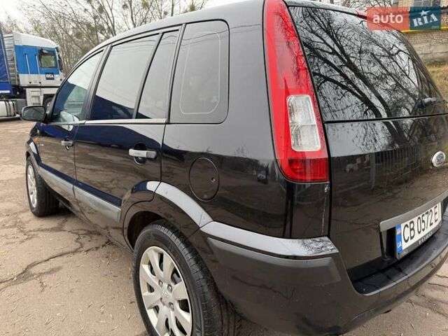 Черный Форд Фьюжн, объемом двигателя 1.4 л и пробегом 216 тыс. км за 3890 $, фото 9 на Automoto.ua