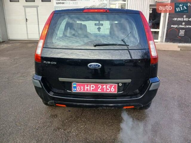 Черный Форд Фьюжн, объемом двигателя 1.4 л и пробегом 185 тыс. км за 5100 $, фото 12 на Automoto.ua