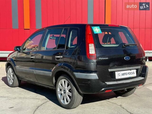 Черный Форд Фьюжн, объемом двигателя 1.4 л и пробегом 235 тыс. км за 4290 $, фото 5 на Automoto.ua