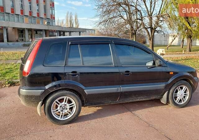 Черный Форд Фьюжн, объемом двигателя 1.6 л и пробегом 318 тыс. км за 4200 $, фото 2 на Automoto.ua