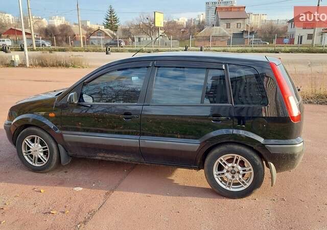 Черный Форд Фьюжн, объемом двигателя 1.6 л и пробегом 318 тыс. км за 4200 $, фото 3 на Automoto.ua