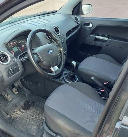 Черный Форд Фьюжн, объемом двигателя 1.6 л и пробегом 318 тыс. км за 4200 $, фото 7 на Automoto.ua