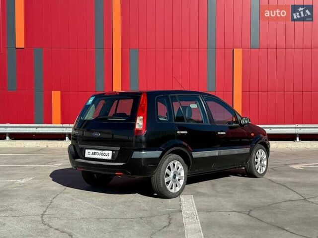 Черный Форд Фьюжн, объемом двигателя 1.4 л и пробегом 235 тыс. км за 4290 $, фото 7 на Automoto.ua