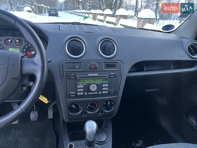 Черный Форд Фьюжн, объемом двигателя 1.4 л и пробегом 211 тыс. км за 5200 $, фото 13 на Automoto.ua