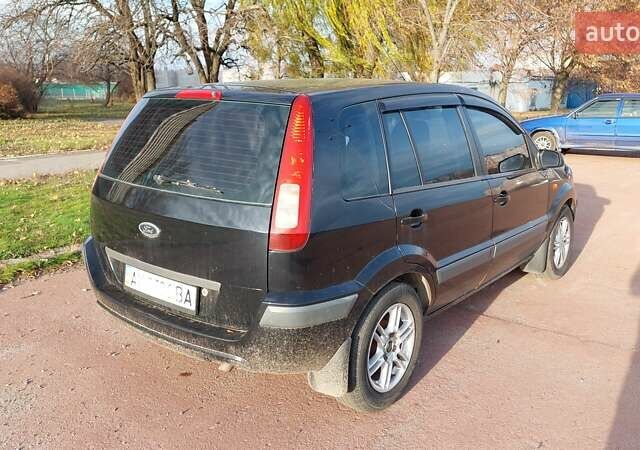 Черный Форд Фьюжн, объемом двигателя 1.6 л и пробегом 318 тыс. км за 4200 $, фото 5 на Automoto.ua