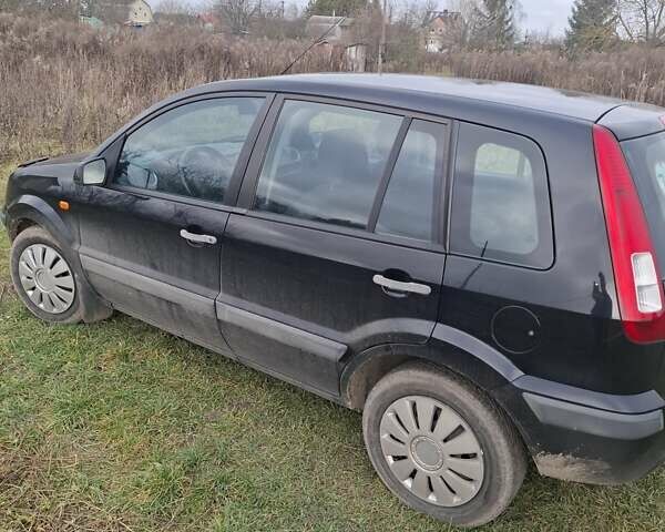 Чорний Форд Фьюжен, об'ємом двигуна 1.39 л та пробігом 215 тис. км за 4100 $, фото 1 на Automoto.ua