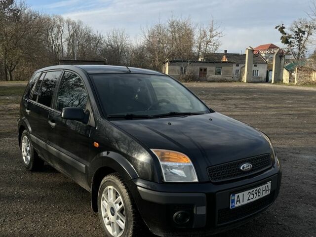 Черный Форд Фьюжн, объемом двигателя 1.4 л и пробегом 267 тыс. км за 4000 $, фото 6 на Automoto.ua