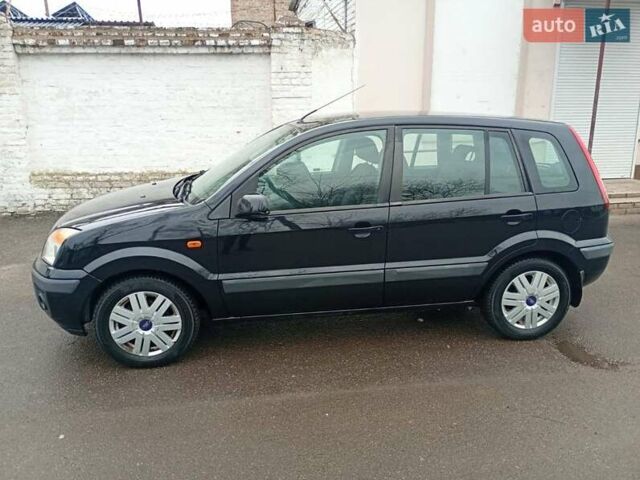 Черный Форд Фьюжн, объемом двигателя 1.6 л и пробегом 180 тыс. км за 4550 $, фото 6 на Automoto.ua