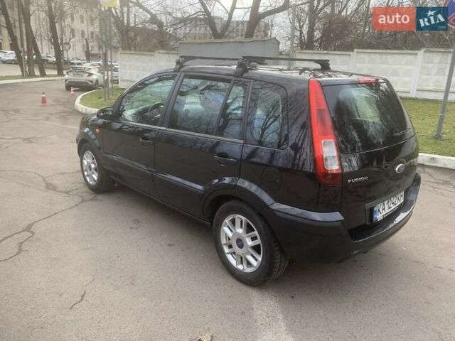 Черный Форд Фьюжн, объемом двигателя 1.39 л и пробегом 192 тыс. км за 4300 $, фото 6 на Automoto.ua