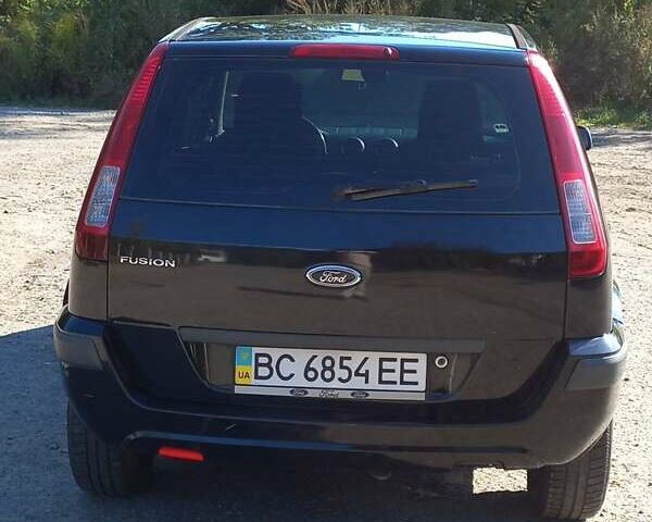 Чорний Форд Фьюжен, об'ємом двигуна 1.6 л та пробігом 312 тис. км за 4900 $, фото 2 на Automoto.ua
