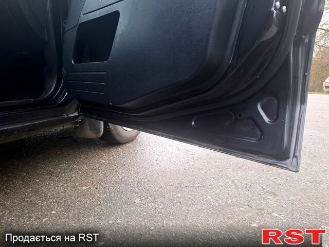 Черный Форд Фьюжн, объемом двигателя 1.4 л и пробегом 218 тыс. км за 5000 $, фото 5 на Automoto.ua