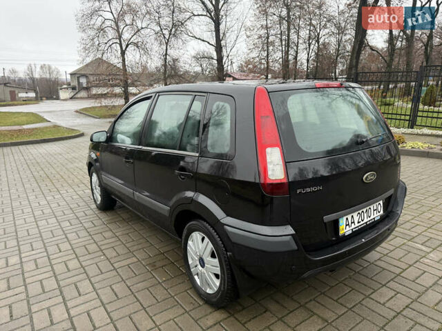 Черный Форд Фьюжн, объемом двигателя 1.6 л и пробегом 147 тыс. км за 4300 $, фото 5 на Automoto.ua