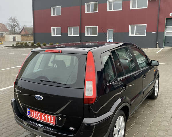 Черный Форд Фьюжн, объемом двигателя 1.6 л и пробегом 193 тыс. км за 6900 $, фото 19 на Automoto.ua