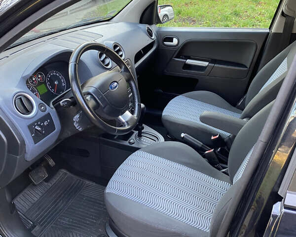 Черный Форд Фьюжн, объемом двигателя 1.6 л и пробегом 160 тыс. км за 7400 $, фото 13 на Automoto.ua