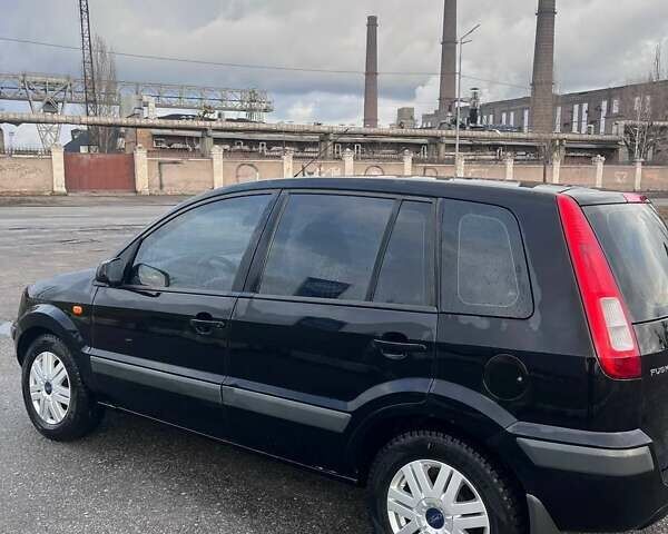 Черный Форд Фьюжн, объемом двигателя 1.6 л и пробегом 215 тыс. км за 4499 $, фото 2 на Automoto.ua