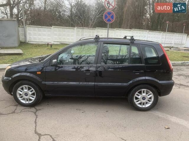 Черный Форд Фьюжн, объемом двигателя 1.39 л и пробегом 192 тыс. км за 4300 $, фото 5 на Automoto.ua