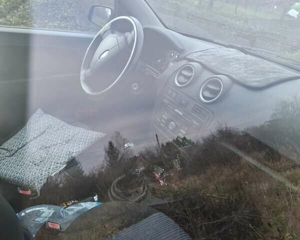 Чорний Форд Фьюжен, об'ємом двигуна 1.39 л та пробігом 215 тис. км за 4100 $, фото 4 на Automoto.ua