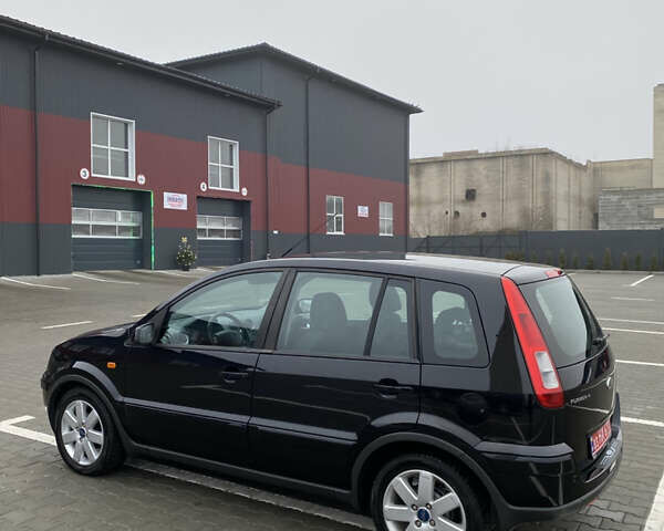 Черный Форд Фьюжн, объемом двигателя 1.6 л и пробегом 193 тыс. км за 6900 $, фото 14 на Automoto.ua