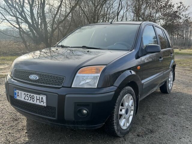 Черный Форд Фьюжн, объемом двигателя 1.4 л и пробегом 267 тыс. км за 4000 $, фото 2 на Automoto.ua