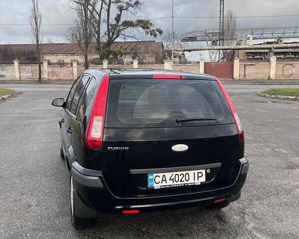 Черный Форд Фьюжн, объемом двигателя 1.6 л и пробегом 215 тыс. км за 4499 $, фото 6 на Automoto.ua