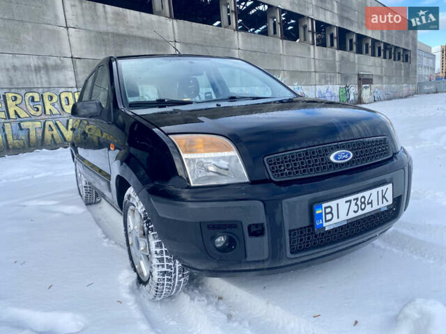 Чорний Форд Фьюжен, об'ємом двигуна 1.4 л та пробігом 193 тис. км за 4350 $, фото 11 на Automoto.ua