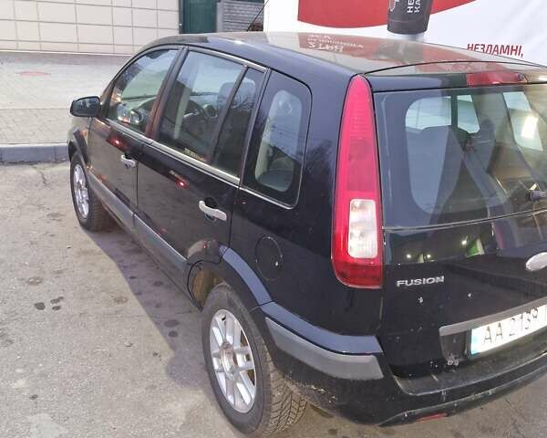 Чорний Форд Фьюжен, об'ємом двигуна 1.4 л та пробігом 200 тис. км за 4350 $, фото 8 на Automoto.ua