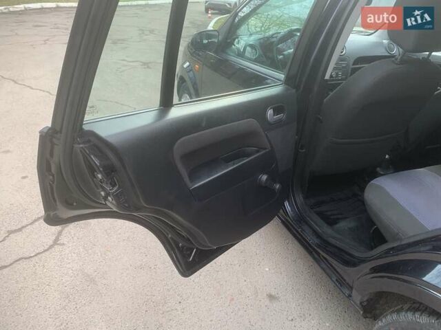 Черный Форд Фьюжн, объемом двигателя 1.39 л и пробегом 192 тыс. км за 4300 $, фото 11 на Automoto.ua