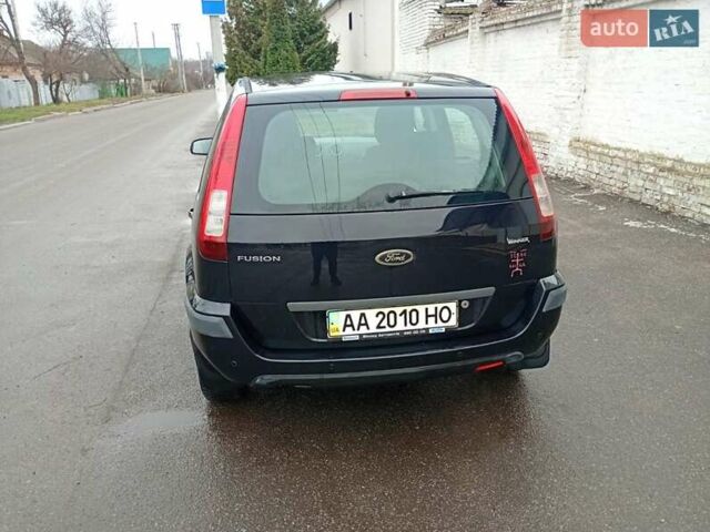 Черный Форд Фьюжн, объемом двигателя 1.6 л и пробегом 180 тыс. км за 4550 $, фото 8 на Automoto.ua