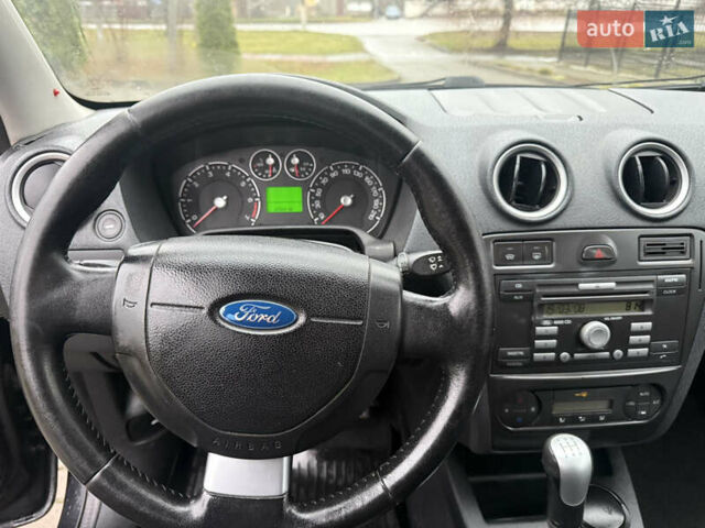 Черный Форд Фьюжн, объемом двигателя 1.6 л и пробегом 147 тыс. км за 4300 $, фото 10 на Automoto.ua