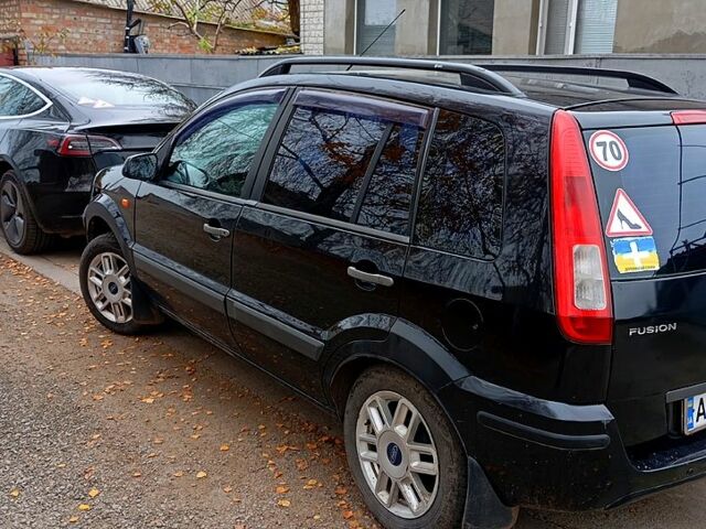 Чорний Форд Фьюжен, об'ємом двигуна 1.4 л та пробігом 260 тис. км за 4300 $, фото 8 на Automoto.ua