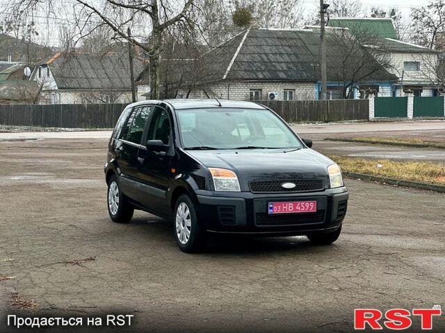 Черный Форд Фьюжн, объемом двигателя 14 л и пробегом 165 тыс. км за 5700 $, фото 4 на Automoto.ua