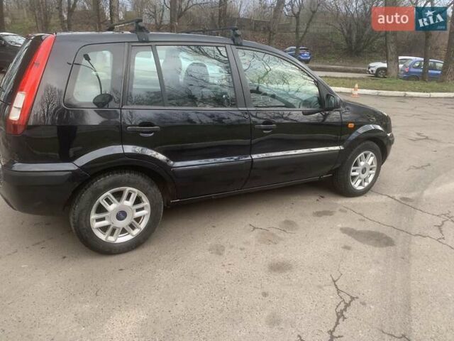 Черный Форд Фьюжн, объемом двигателя 1.39 л и пробегом 192 тыс. км за 4300 $, фото 17 на Automoto.ua