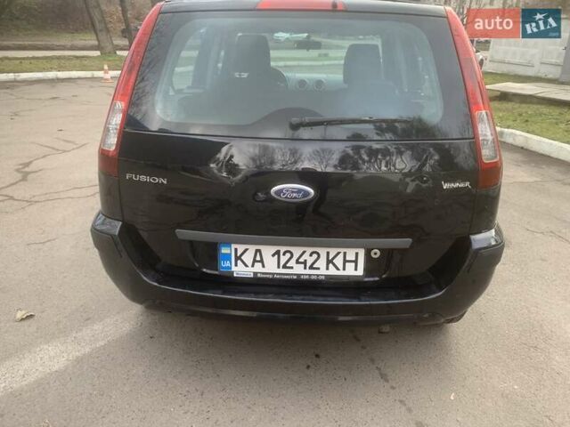 Черный Форд Фьюжн, объемом двигателя 1.39 л и пробегом 192 тыс. км за 4300 $, фото 7 на Automoto.ua